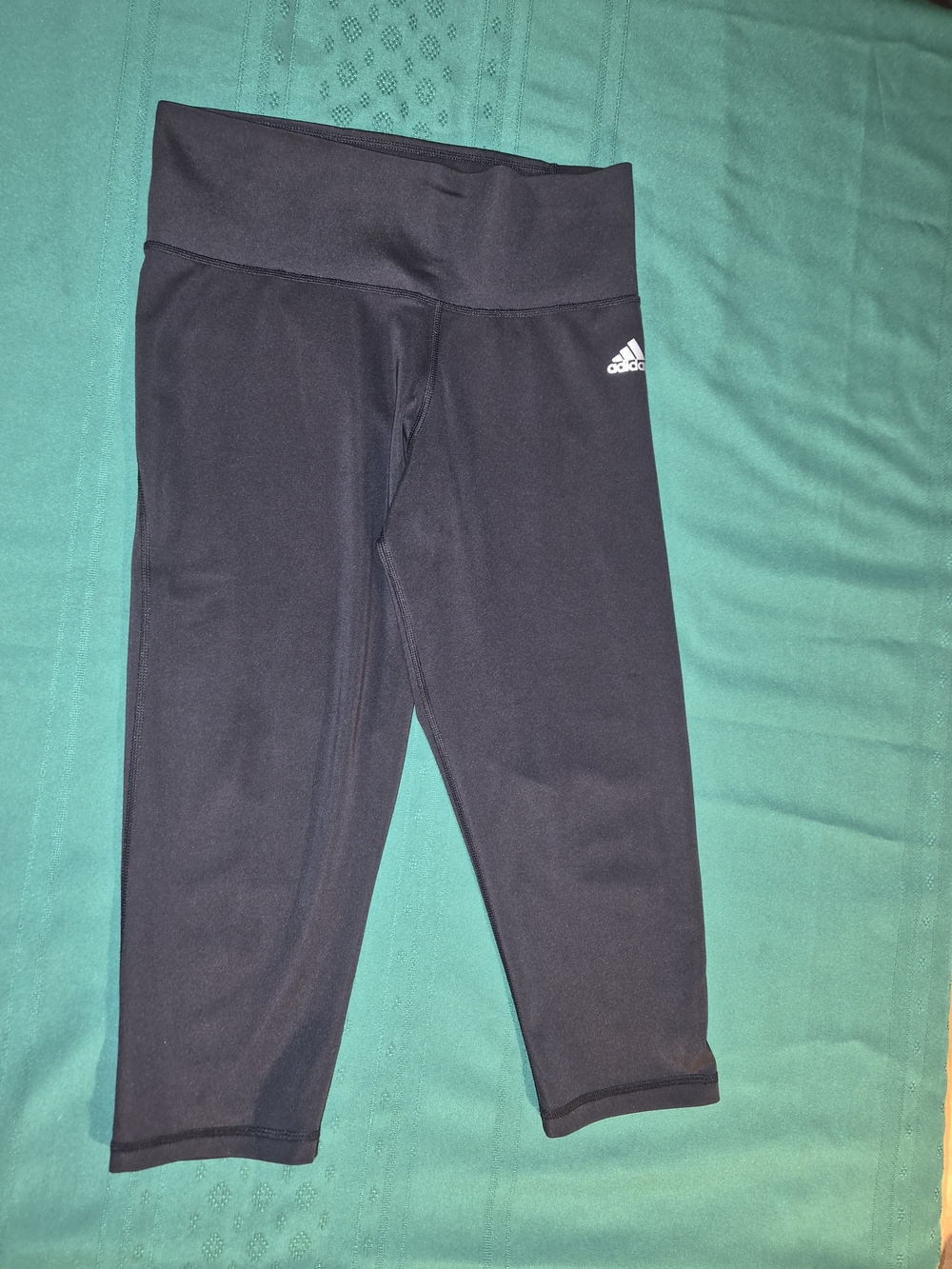 Black Adidas Climalite capri leggings featuring a stretchy fit